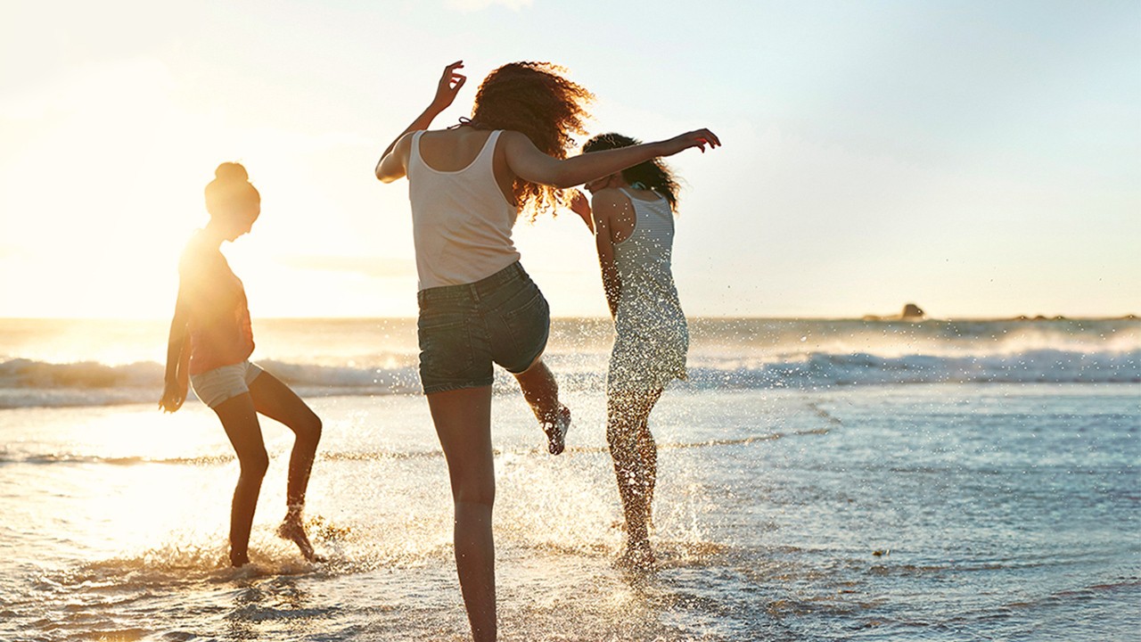 Young women with two kids running free 